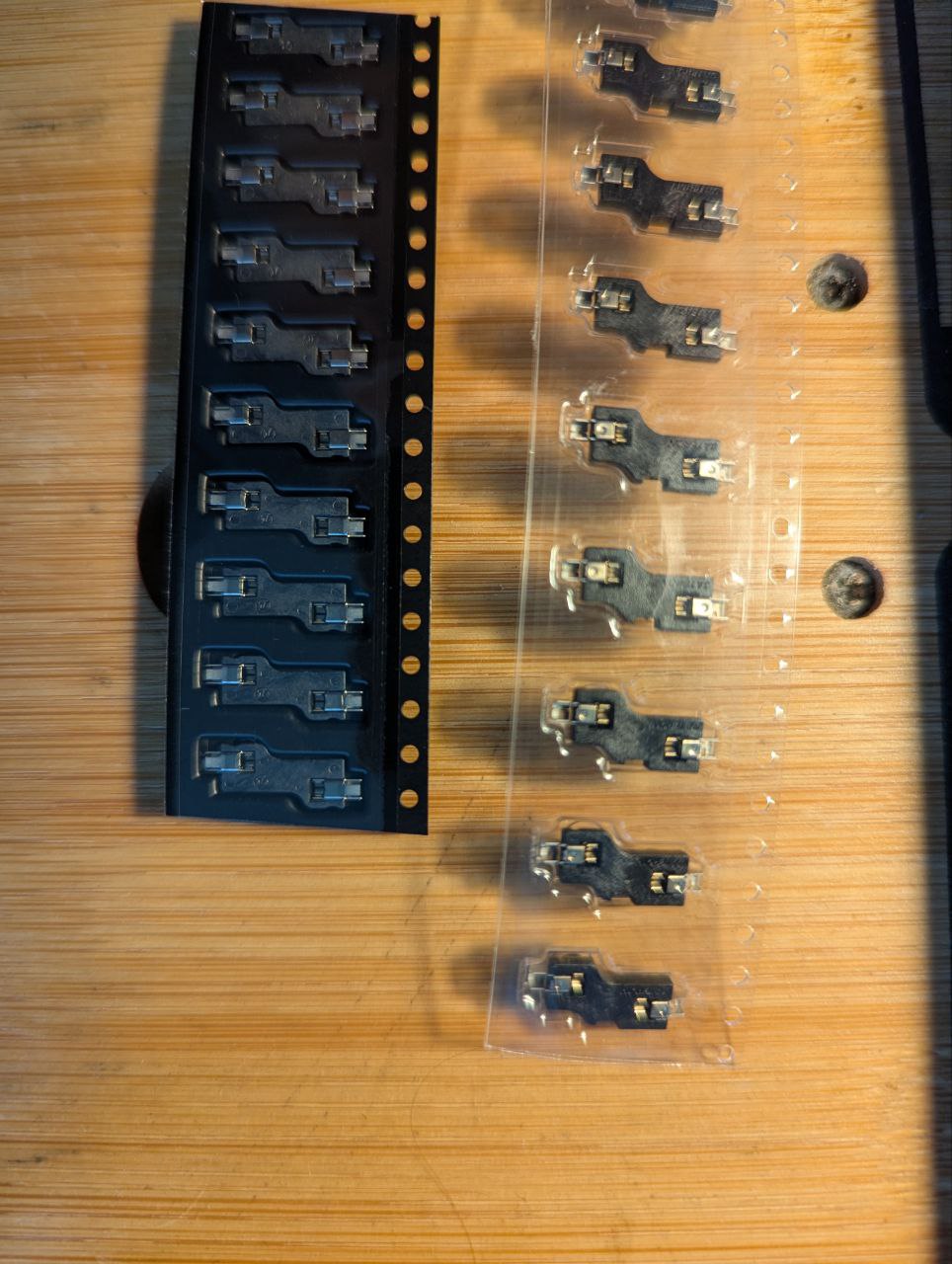 Comparison between low-profile (left) and standard (right) hotswap sockets.