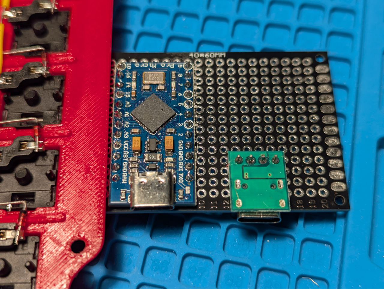 The PCB plate with microcontroller and USB-C socket soldered.