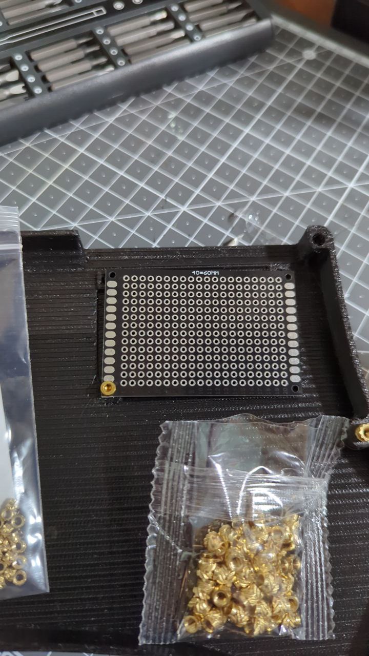 The PCB plate parts and hotmelt sockets ready for a test fit.