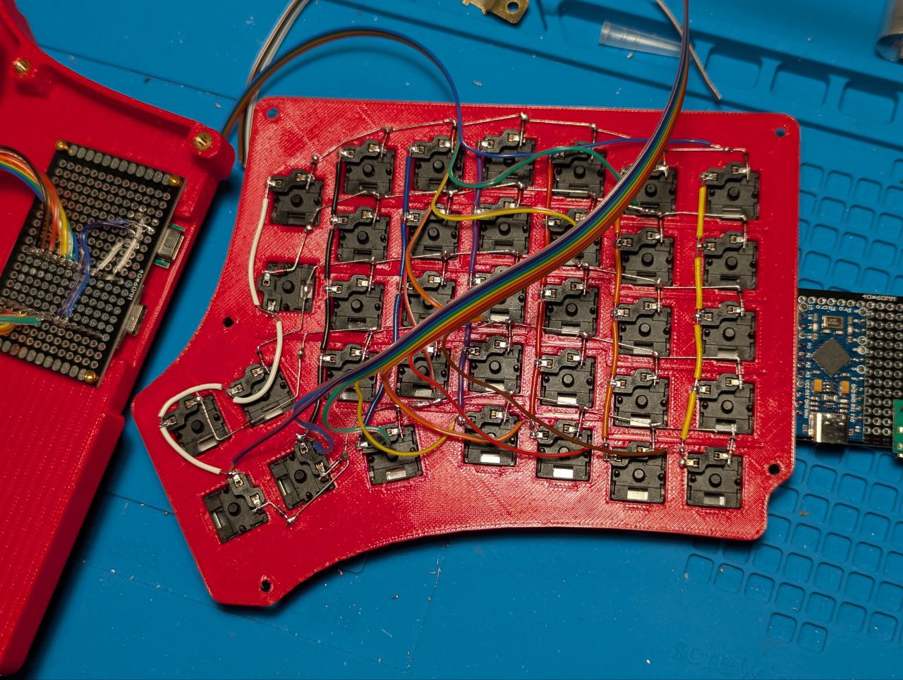 One half of the keyboard, partially wired.